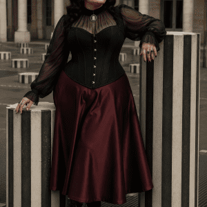 Corset gothique noir grande taille porté avec une jupe midi satinée bordeaux au Palais Royal à Paris entre les colonnes de Buren dans un style éditorial élégant